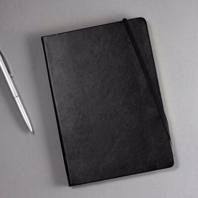 black-notebook-grey-background-copy-space_376538-2062